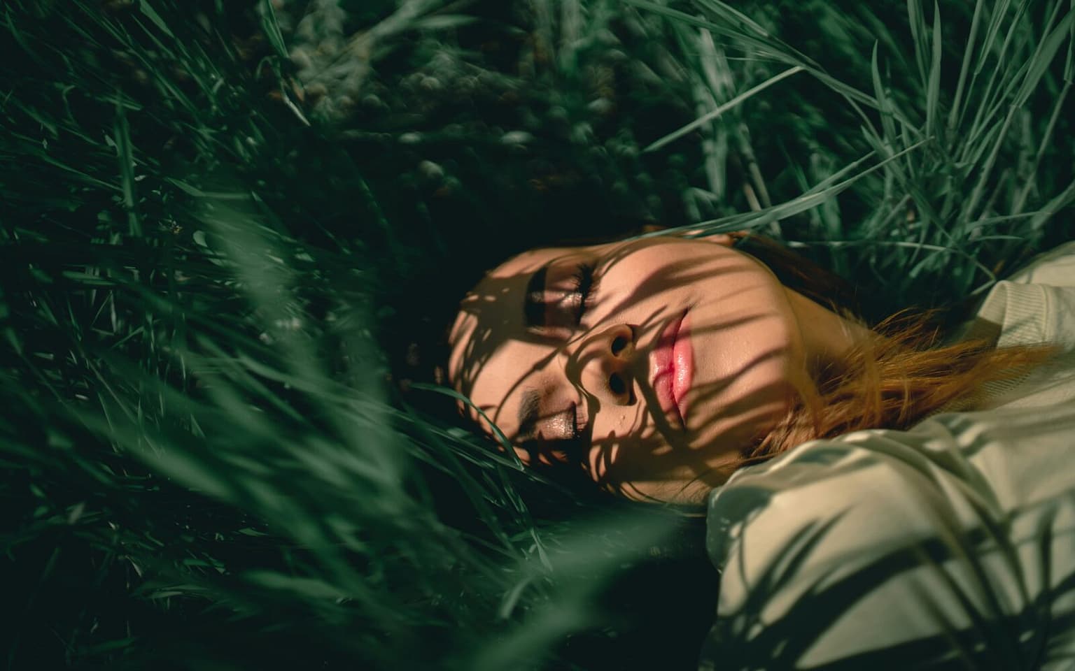 Homepage Header Image Woman on Grass
